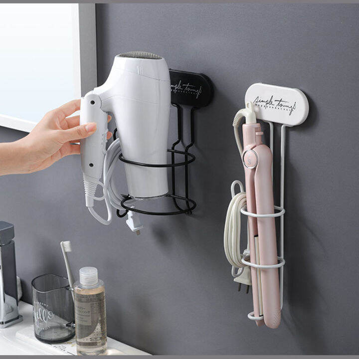 Curling iron wall outlet holder