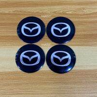 โลโก้* MAZDA ( s ) โลโก้ฝาครอบล้อ โลโก้ติดดุมล้อ ขนาด : เส้นผ่าศูนย์กลาง 56 mm  (ราคาต่อชุด มี 4 ชิ้น )