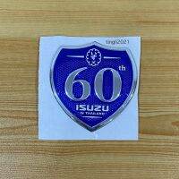 โลโก้* แผ่นป้าย ISUZU 60 ปี งานเรซิ่น  ติดรถ ISUZU D-MAX ALL NEW  ( ขนาด* 7.3 x 7.8 cm ) ราคาต่อชิ้น