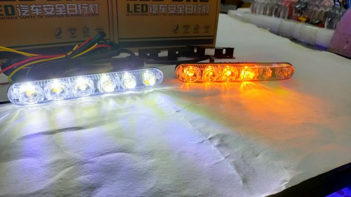 ledไฟเดย์ไลท์ติดหน้ารถยนต์แสงสีขาว-มีไฟเลี้ยววิ่งสีเหลืองในตัวขนาดยาว17cm-รุ่นไฟเดยไลท์2เลนส์มีไฟเลี้ยววิ่ง