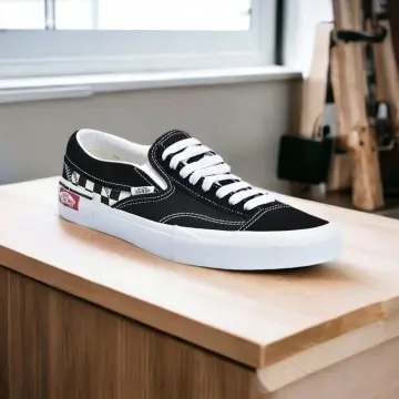 Vans slip on cut and paste black on sale white