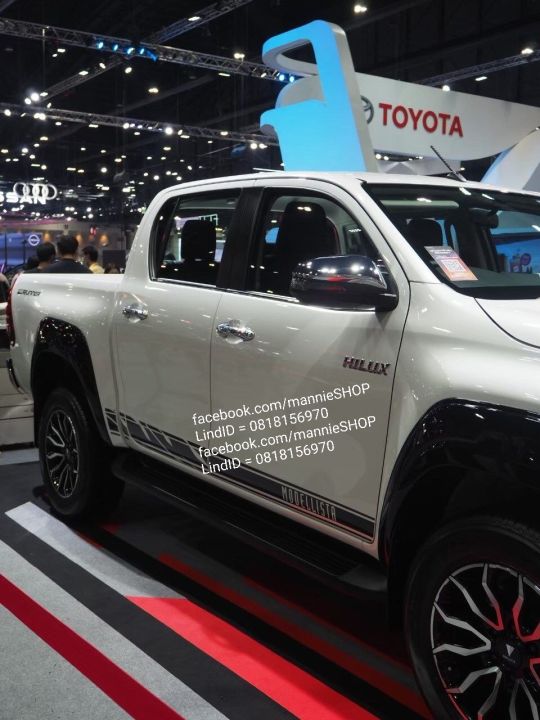 สติ๊กเกอร์งานตัดคอมติดชายล่างประตู-รถ-toyota-revo-รุ่น-prerunner-ปี-2021-คำว่า-modellista-โตโยต้า-รีโว้-sticker-ติดรถ-แต่งรถ-เส้นยาว-ยาว-สวย-ปี2021