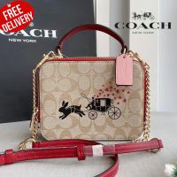 กระเป๋าถือ กระเป๋าสะพาย Coach Lunar New Year Box Crossbody In Signature Canvas With Rabbit And Carriage