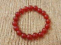 กำไลมงคล คาร์เน​เลี่ยน​ Carnelian​ สีแดงปะการัง​ ขนาด 10 mm  ส่งเสริม บารมี มีผู้อุปถัมภ์ ชีวิตสุขสบาย เส้นรอบวงภายใน 18 cm. สินค้า​พร้อม​ส่ง