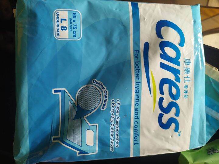 caress underpads large (opened) 5pcs Lazada PH