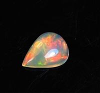 โอปอลหลากสีธรรมชาติ 0.60cts ลูกแพร์ 8x6mm 0.60cts natural multi color play opal 8x6mm pear