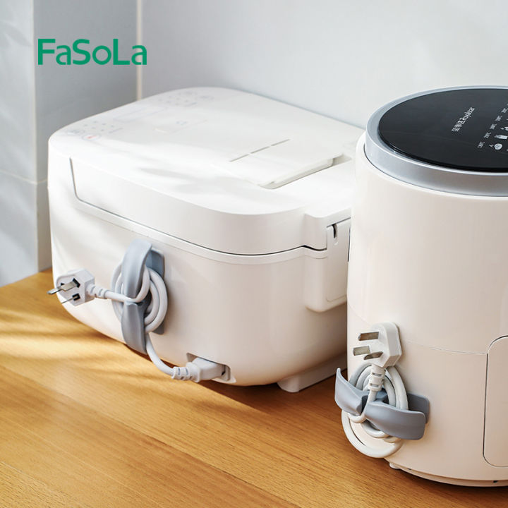 Fasola เครื่องม้วนสายสำหรับเครื่องใช้ไฟฟ้าในครัวอุปกรณ์ จัดเก็บสายไฟพันกันสำหรับปลั๊กใช้ในบ้านตะขอแขวนติดแบบไม่ต้องเจาะรู |  Lazada.Co.Th