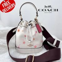 กระเป๋าสะพาย Coach CF165 Dempsey Drawstring Bucket Bag 15 With Shooting Star Print Print