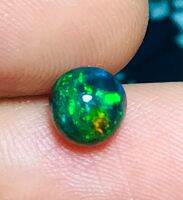 0.66cts โอปอลดำ 6มม. ทรงกลม 1 ชิ้น 0.66cts black opal 6mm round 1 piece