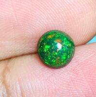 0.58cts โอปอลดำ 6มม. ทรงกลม 1 ชิ้น 0.58cts black opal 6mm round 1 piece