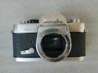 กล้องฟิล์มวินเทจ​ minolta​ sr-1 ขึ้นฟิล์มไม่ได้​ มีบุบด้านหน้าและปุ่มตั้งเวลาไม่มีตามมือชี้  เอาไปสะสม​ หรือซ่อมใช้งาน