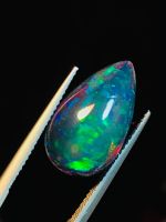 5.47cts สีธรรมชาติ รมดำรมดำ 18.3x11.2x6mm 5.47cts natural color play black opal 18.3x11.2x6mm