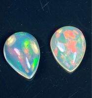 โอปอลหลากสีธรรมชาติ 1.25cts 8x6มม. แพ็คคู่ 2 ชิ้น. 1.25cts natural multi color play opal 8x6mm pair 2 pieces