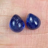 ไพลินสีน้ำเงินธรรมชาติ 5.72cts คู่หลังเบี้ย 8.4x7x5.2mm 5.72cts natural blue sapphire cabochon pair 8.4x7x5.2mm