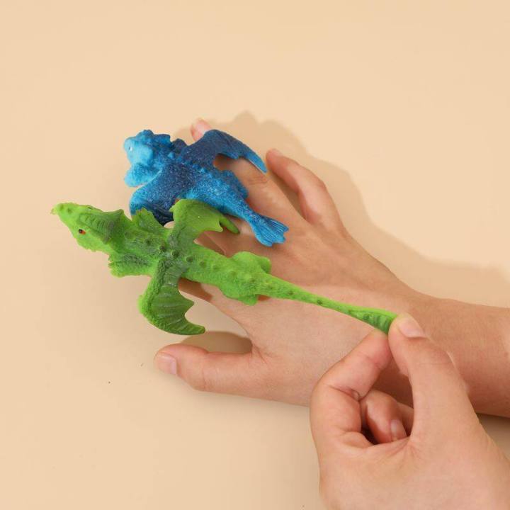 TPR Dinosaur Catapult Toy Simulated Animal Slingshot Flying