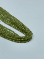 Peridot 2MM cube shape beads.