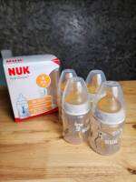 Nukขวดนมเด็กติดเต้า 150 ml จุกยางธรรมชาติเสมือนนมแม่ ขวดมีแถบวัดอุณหภูมิ