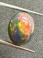 โอปอลดำ 2.25cts 10.8x8.5x5mm ทรงกลม พลอยธรรมชาติ 100% Black opal 2.25cts 10.8x8.5x5mm round shape 100% natural gemstone