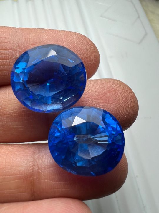 บลูโทพาสย-blue-topaz-culture-stone-พลอย100-lab-made-กะรัต-13x15-มิลลิเมตร-2-เม็ด-mm-รูปไข่-สะอาดตา-27-กะรัต