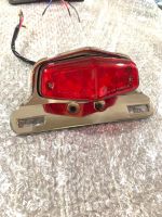 ไฟท้ายแต่งแป้นเหล็ก ขนาดเลนส์4 นิ้ว พร้อมหลอดไฟ Tail lights decorated with steel back, lens size 4 inches, with bulbs SR400-500