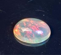 โอปอลเล่นสีธรรมชาติ 0.92cts 8.8x6.5mm 0.92cts natural color play opal 8.8x6.5mm