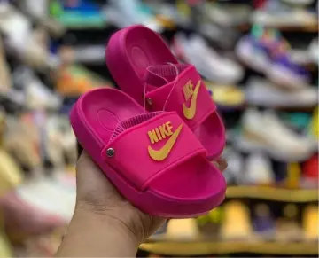 Purple gold hot sale nike slides