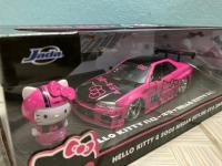 รถโมเดลเหล็ก HELLO KITTY NISSAN SKYLINE GT-R (BNR34) สเกล 1 ต่อ 24