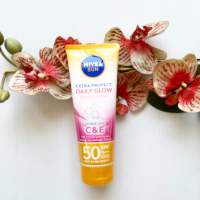ผลิต 01/23 นีเวีย ซัน เอ็กซ์ตร้า โพรเท็ค เดลี่ โกลว์ สีชมพู 180 ml. Nivea Sun Extra Protect Daily Glow Essence Serum