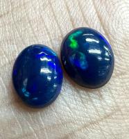 แบล็คโอปอล 1.86cts 9x7mm รูปไข่ พลอยธรรมชาติ 100% Black opal 1.86cts 9x7mm oval shape 100% natural gemstone