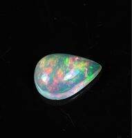 โอปอลหลากสีธรรมชาติ 0.52cts ลูกแพร์ 7.3x5มม 0.52cts natural multi color play opal 7.3x5mm pear