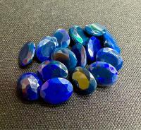 โอปอลสีน้ำเงิน ทรงรี ขนาด 9x7 มม. พลอยธรรมชาติ 100% Blue opal cut 9x7mm oval shape 100% natural gemstone