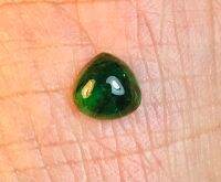 พลอยมรกตธรรมชาติหลังเบี้ย 1.45cts 7x4mm 1.45cts natural emerald cabochon gemstone 7x4mm