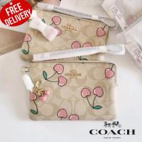 Coach Corner Zip Wristlet In Signature Canvas With Heart Cherry Print