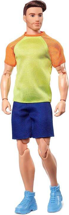 Barbie Looks Ken Doll With Brown Hair Dressed In Orange And Yellow Tee