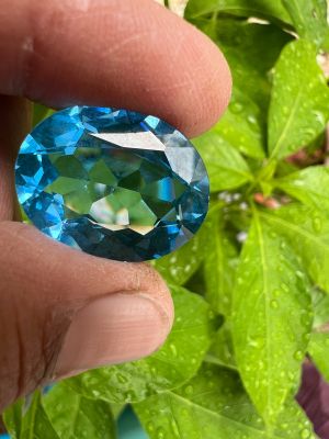 บลูโทแพซ 22 กะรัต (LAB MDE CULTURE STONE BLUE TOPAZ) สี บลูโท แพซ พลอย LAB MADE 100%. ราคาเป็น 1 เม็ด. พลอย ขนาด 15X20 MM มิล