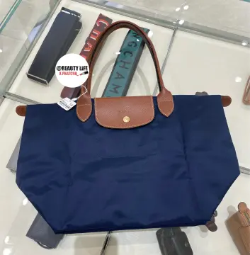 Longchamp le pliage discount cuir king power