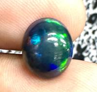 โอปอลดำ 2.33cts 11x9x5mm รูปไข่ หินธรรมชาติ 100% Black opal 2.33cts 11x9x5mm oval shape 100% natural gemstone