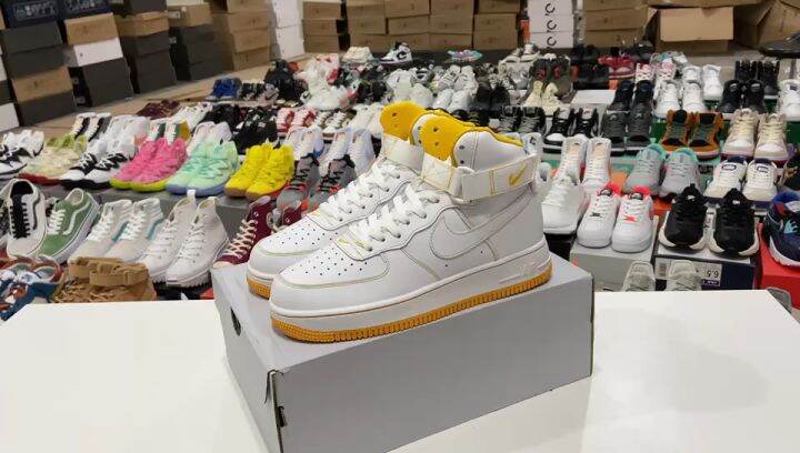 white and yellow air force 1 high top
