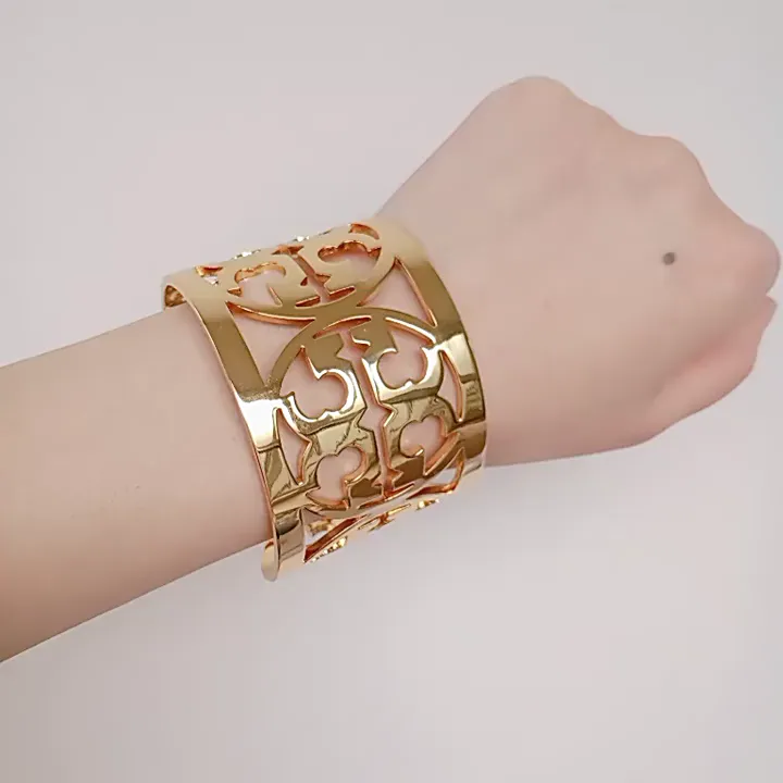Tory Burch Advanced Light Luxury Versatile Simple Metal Texture Hollowed-out Wide Micro Label Open Bracelet | Lazada PH Tory Burch Advanced Light Luxury Versatile Simple Metal Texture Hollowed-out Wide Micro Label Open Bracelet | Lazada PH