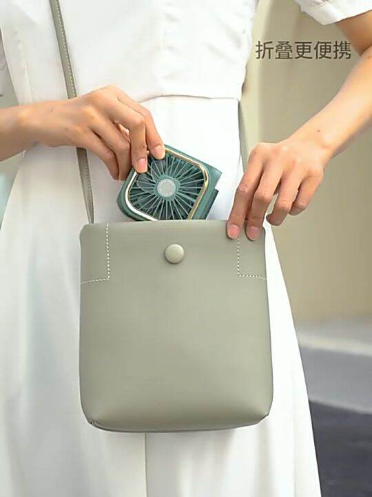 New powerbank Fan Arrived with Phone Holder Handheld Fan Power Bank