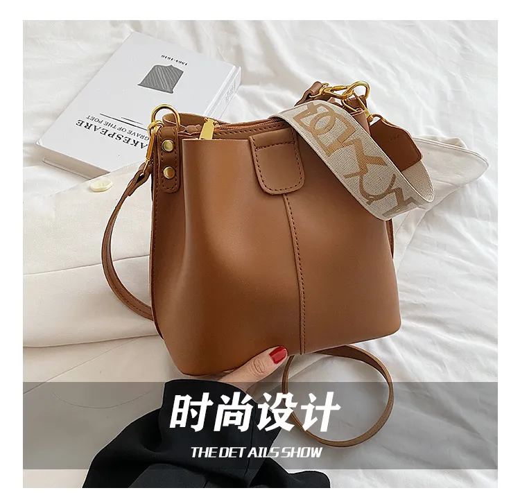 Wide strap bucket on sale bag