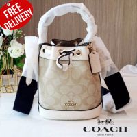 กระเป๋าสะพาย Coach Dempsey Drawstring Bucket 15 In Signature Canvas