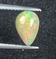 โอปอลหลากสีธรรมชาติ 0.62cts ลูกแพร์ 9x6mm 0.62cts natural multi color play opal 9x6mm pear