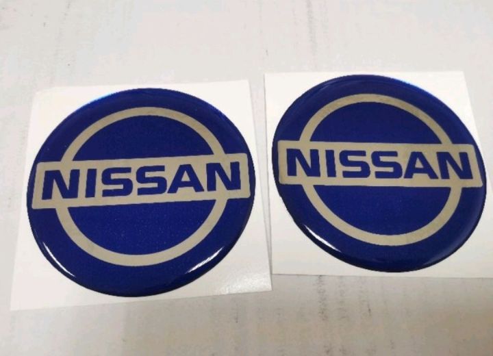 สติ๊กเกอร์กลม-เทเรซิ่นนูนอย่างดี-โลโก้-นิสสัน-ติดรถ-แต่งรถ-sticker-logo-nissan-logo-ติดดุมล้อ-ดุมล้อ-สวย-กลม-โลโก้-นิสสัน-logo-nissan-logo-โลโก้นิสสัน