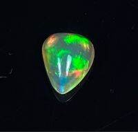 โอปอลหลากสีธรรมชาติ 0.45 กะรัต ลูกแพร์ 6.8x5 มม 0.45cts natural multi color play opal 6.8x5mm pear