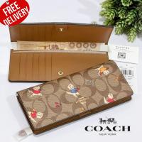 กระเป๋าสตางค์ ใบยาว COACH Slim Wallet In Signature Canvas With Cat Mittens Print