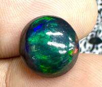 โอปอลดำ 3.82cts 11x6มม. ทรงกลม หินธรรมชาติ 100% Black opal 3.82cts 11x6mm round shape 100% natural gemstone