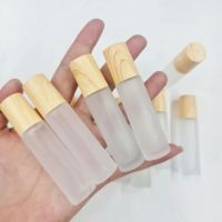 ขวดลูกกลิ้ง ขวดขุ่น-ฝาลายไม้ 10ml (แพ็ค12ขวด)