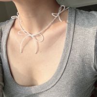 Triple bow necklace