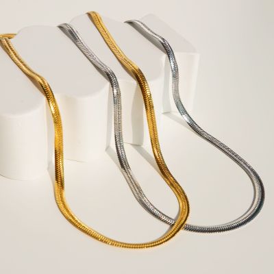 RINDA - Curve bone (gold/silver) (stainless steel)